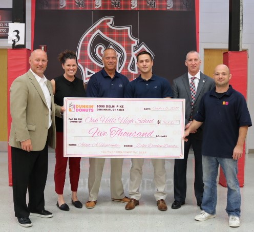Dunkin' gives OHHS a $5,000 check for Adopt A Highlander Dunkin' gives OHHS a $5,000 check for Adopt A Highlander